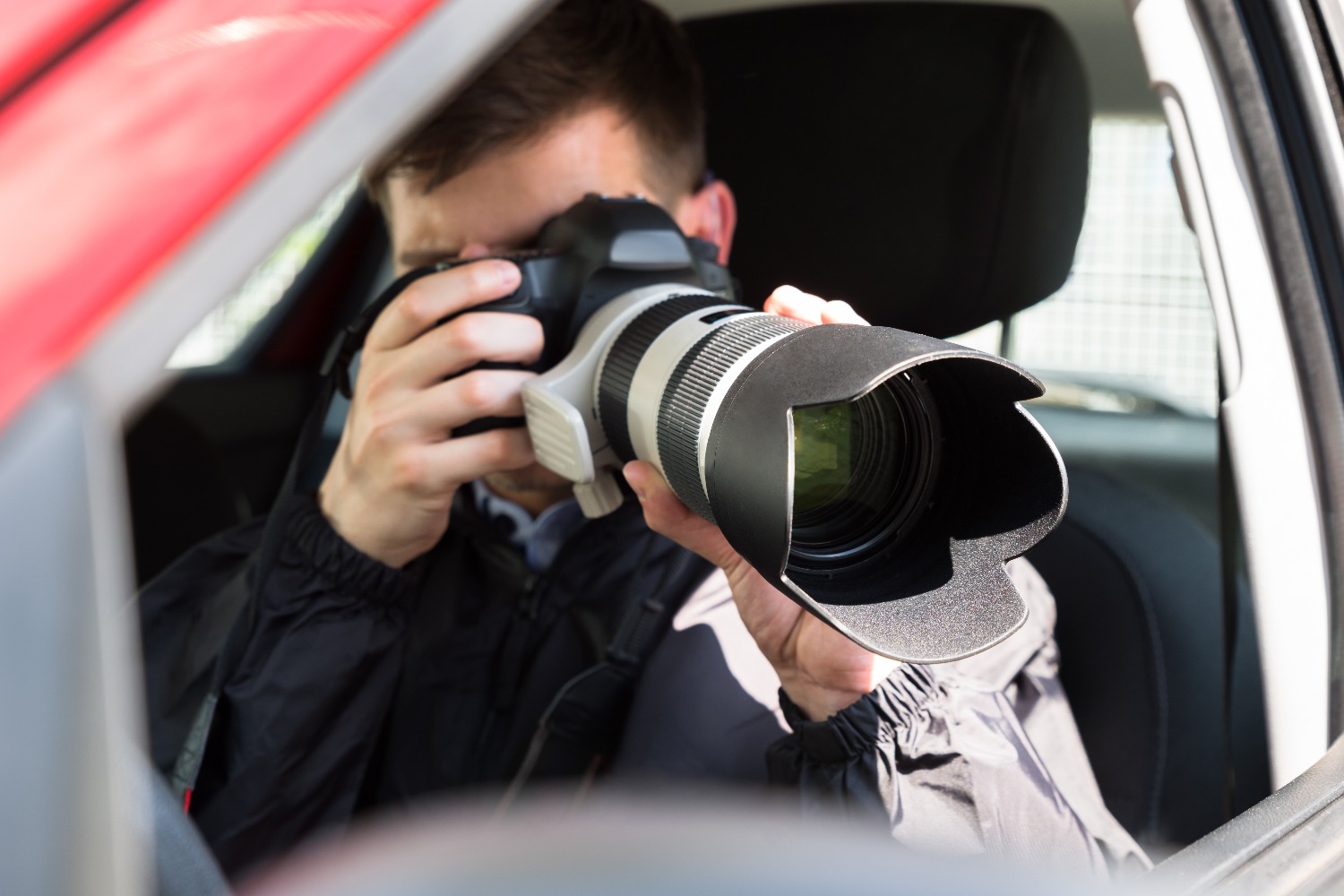 Private Detective Photographing With Slr Camera